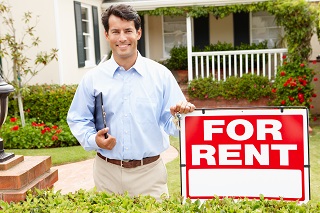 a man holding a sign