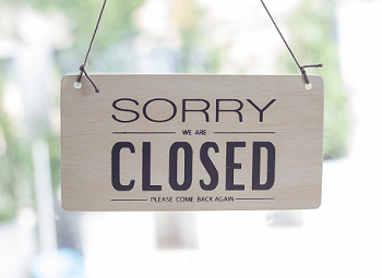 Sign on door of business that reads Sorry We Are Closed Please Come Back Again